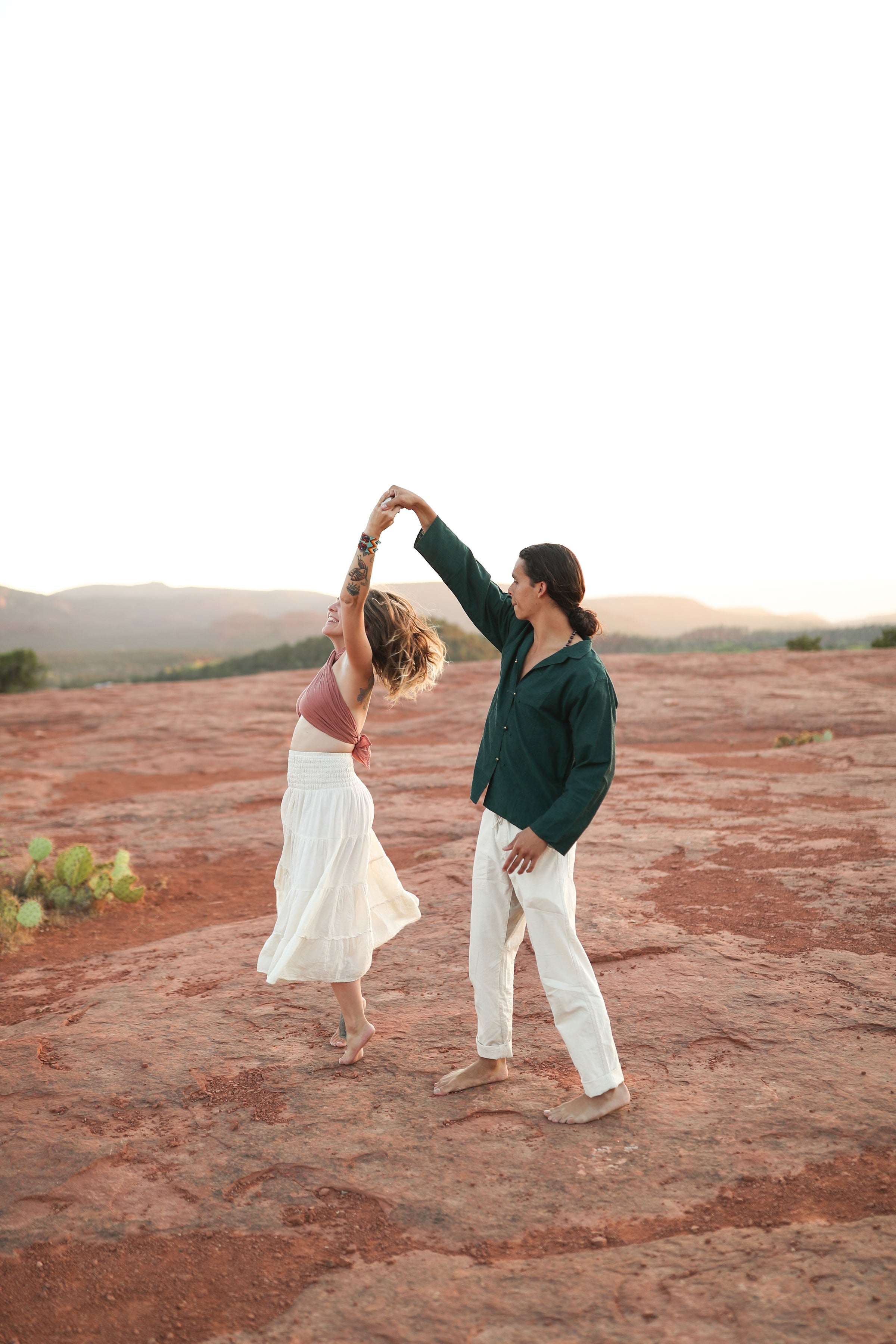 Couple dancing in cotton gauze clothing