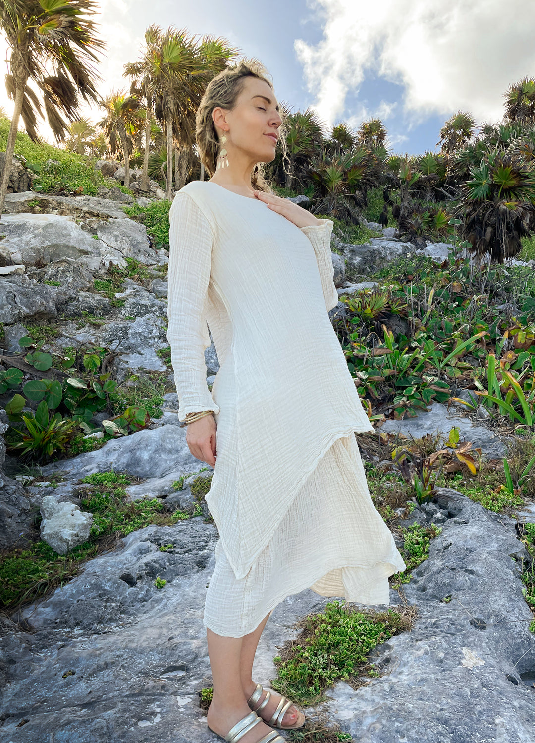 Woman wears un-dyed white gauze cotton dress